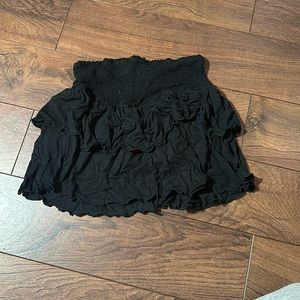Black ruffle mini skirt